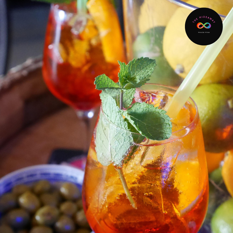 Frosted glass containing The Act Up Soura signature gay bar cocktail in Phnom Penh