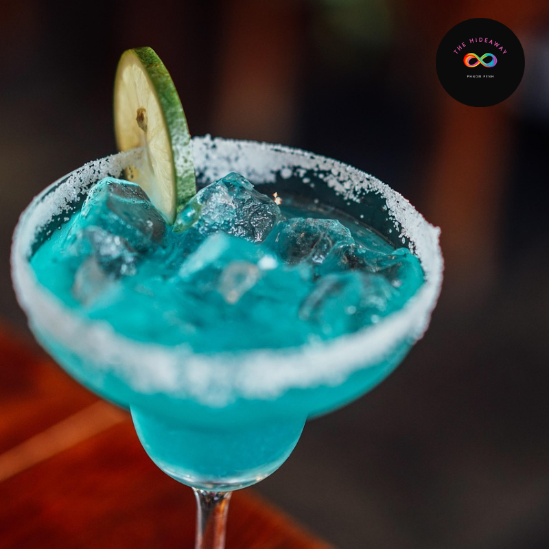 Signature Pride Pour drink The Violet Hour, a tribute cocktail at a Phnom Penh gay bar