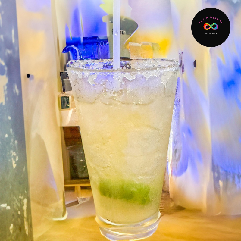 The Lavender Menace cocktail, embodying the fun and inclusive vibe of a Phnom Penh gay bar