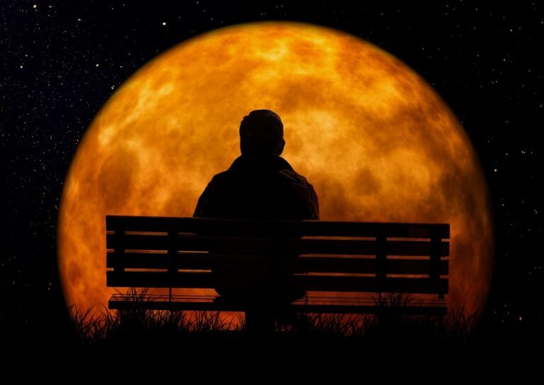 park bench in front of red moon in retirement
